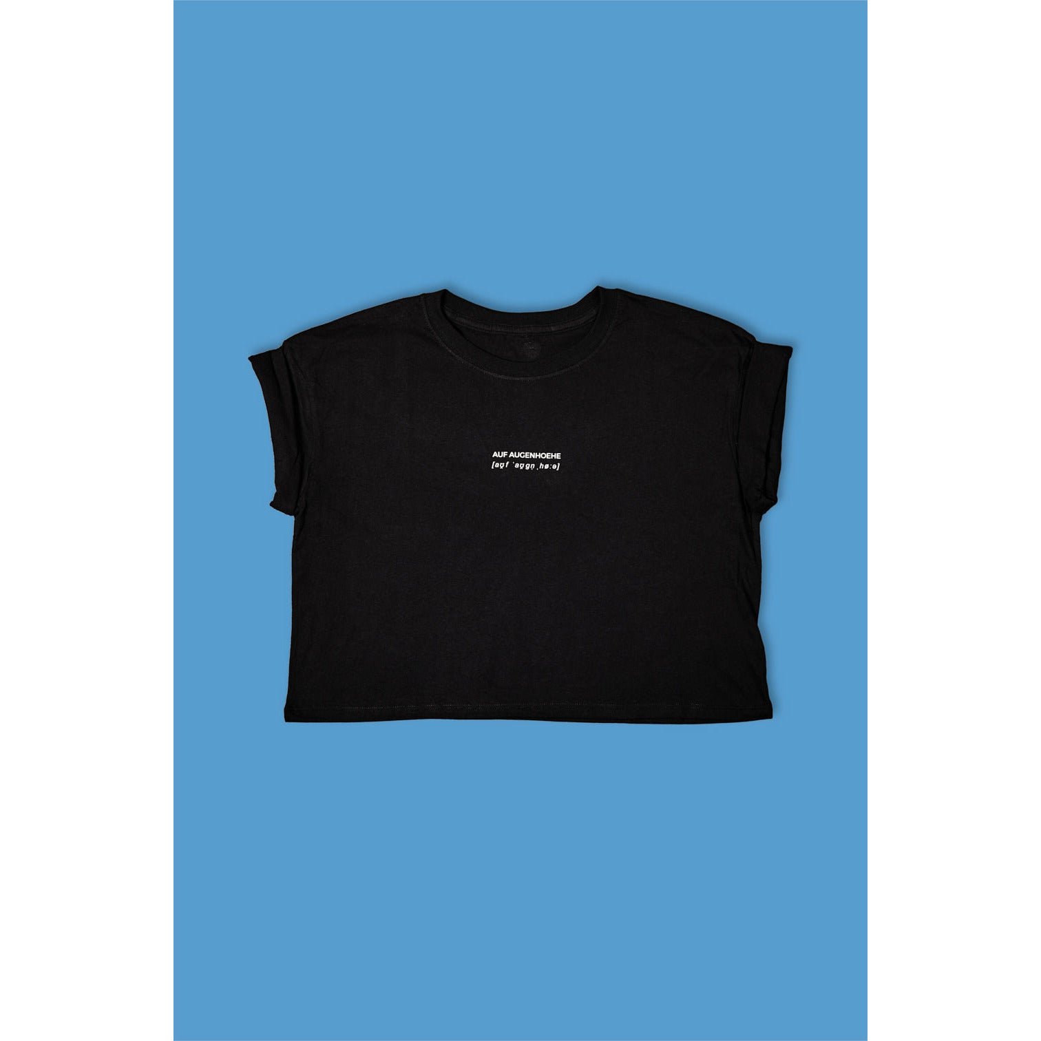 black crop top with small white text