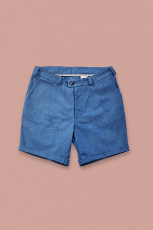 blue denim shorts on rose background