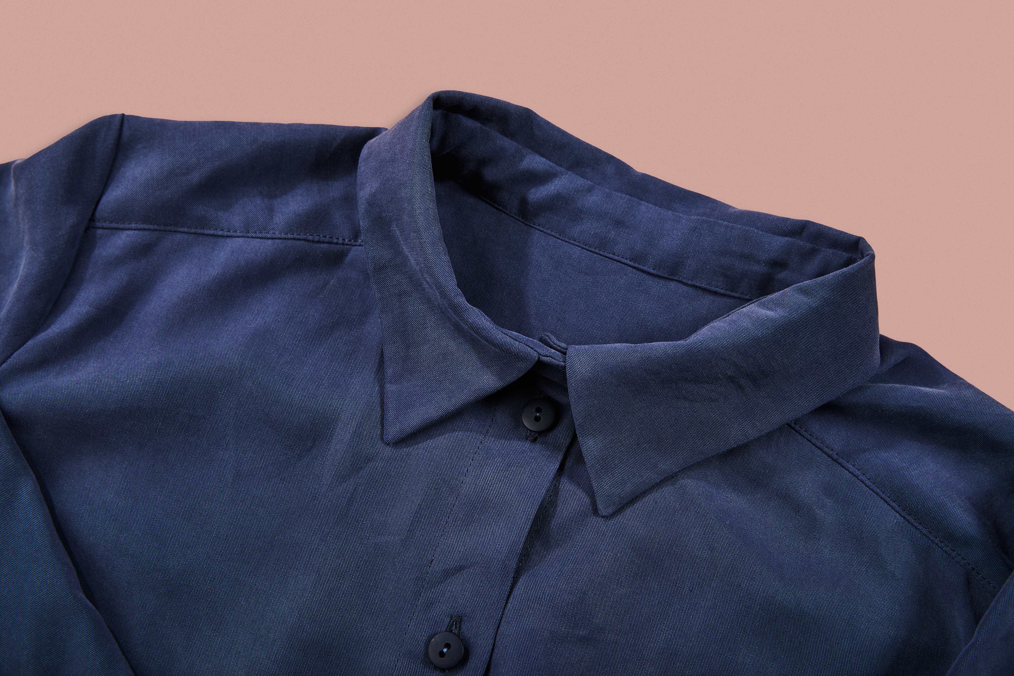 detailed view of collar of blue blouse