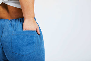 detailed view of backpocket of blue jeans for people with dwarfism