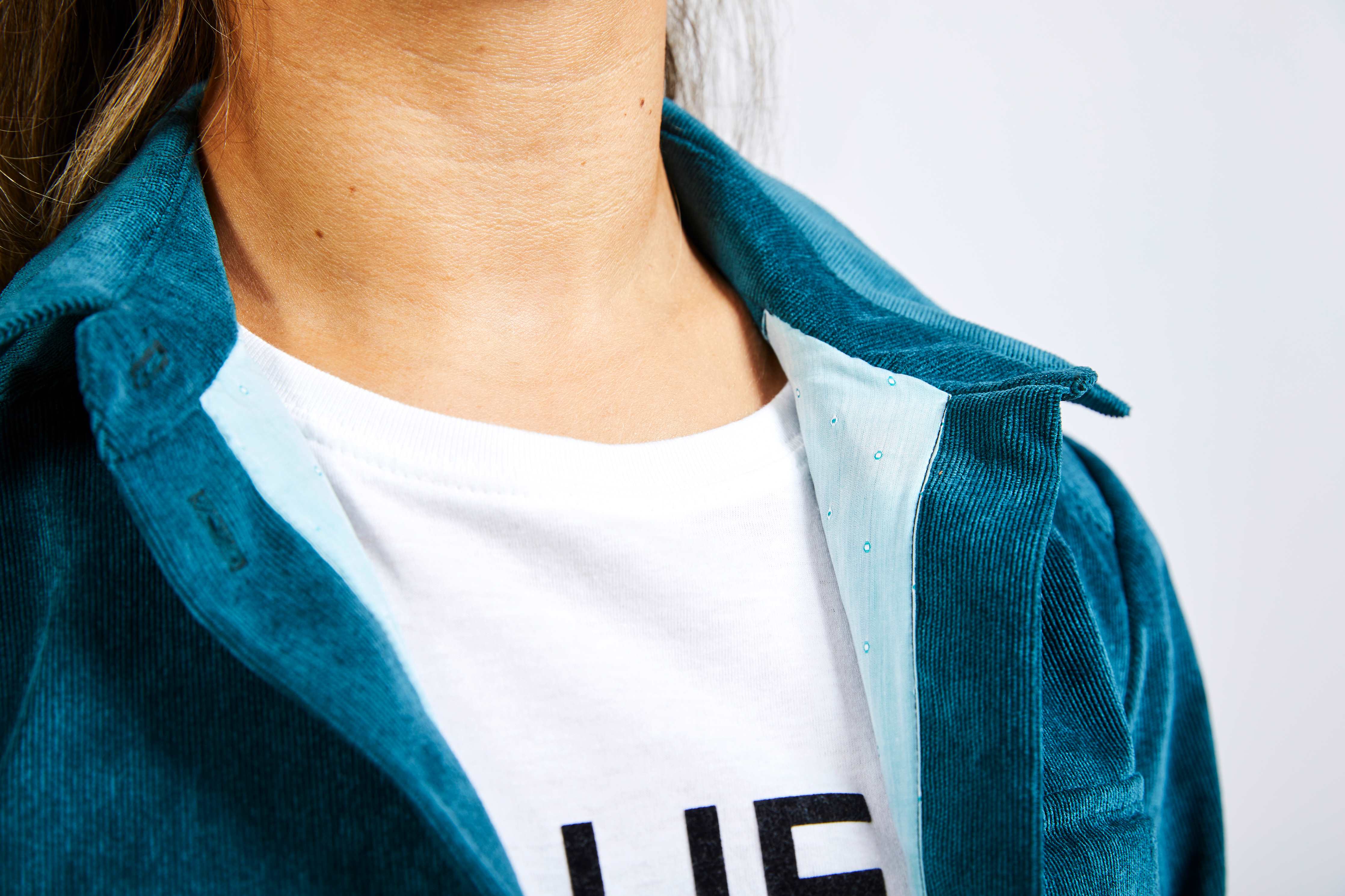 detailed view of blue corduroy jacket collar