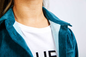 detailed view of blue corduroy jacket collar