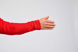 detailed view of red pullover sleeve