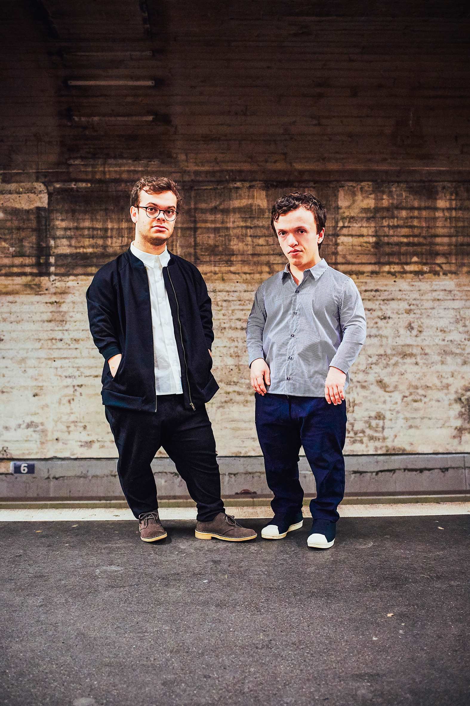 two men with dwarfism wearing street style outfits tailored for little people