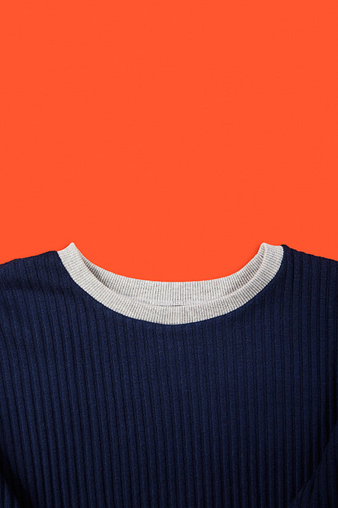 detailed view of blue pullovers collar