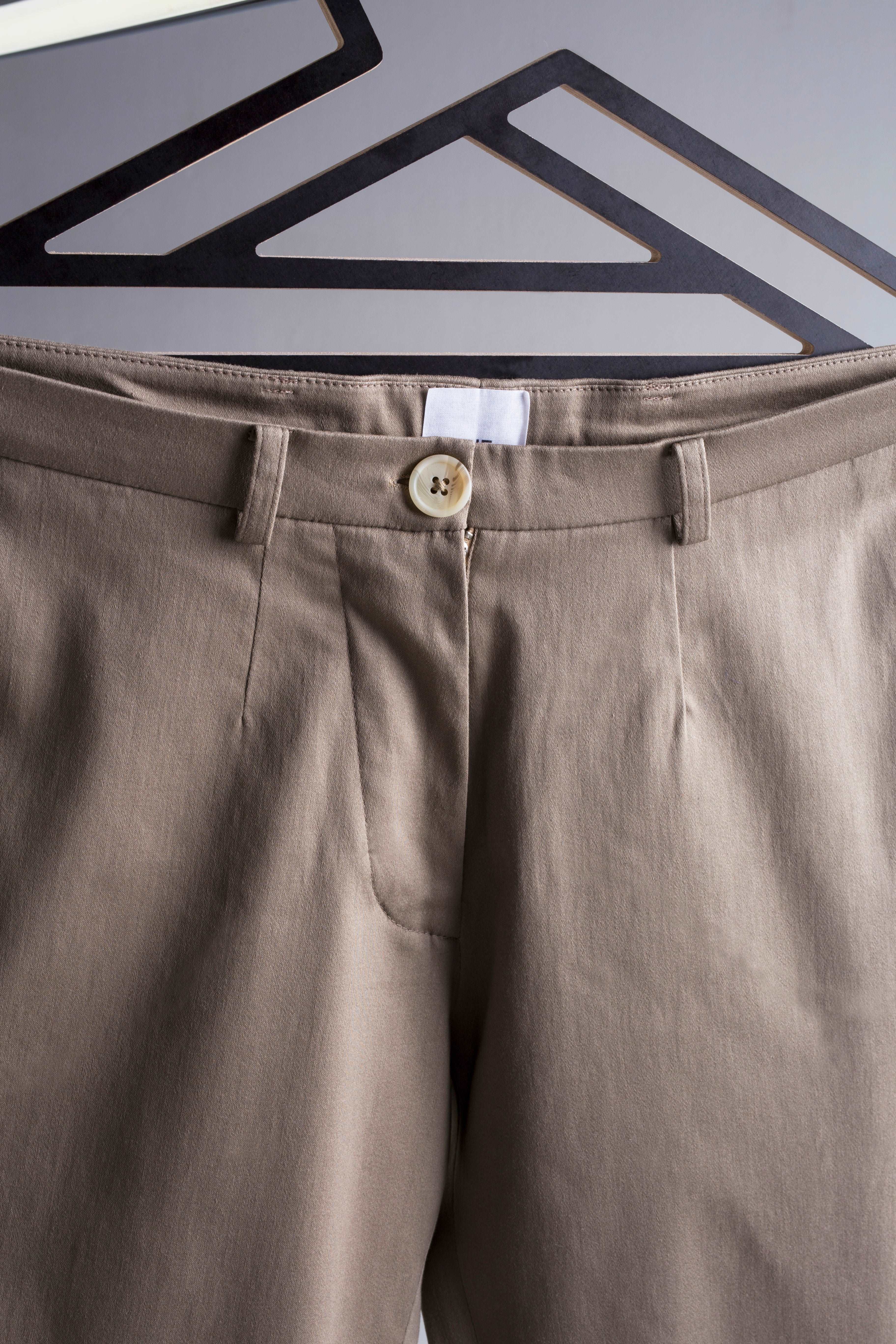 detailed view of sand coloured pants for people with dwarfism